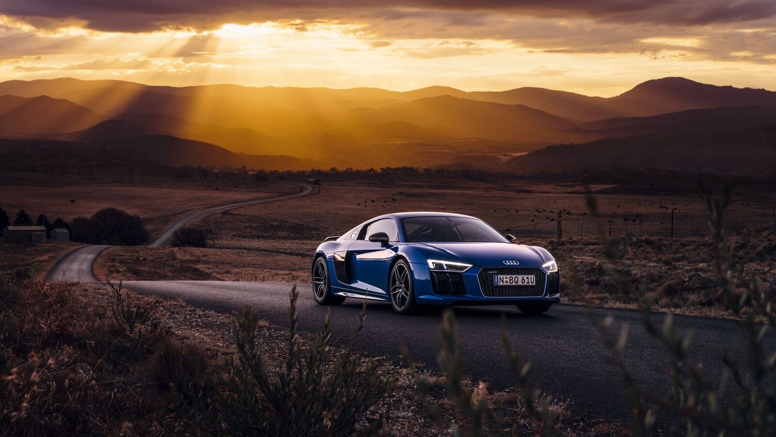 audi_r8_v10_side_view_road_109803_1920x1080.jpg
