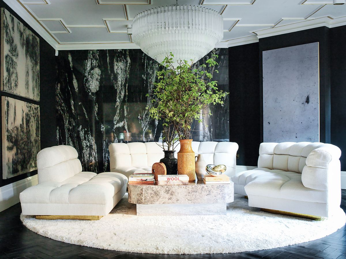 grand-Design-featuring-white-sofa-and-marble-walls.jpg