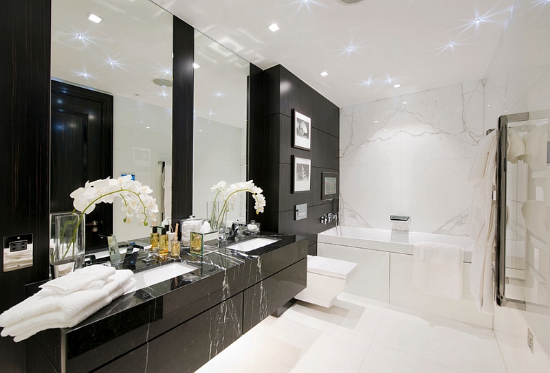 Frameless-mirrors-above-the-bathroom-vanity.jpg